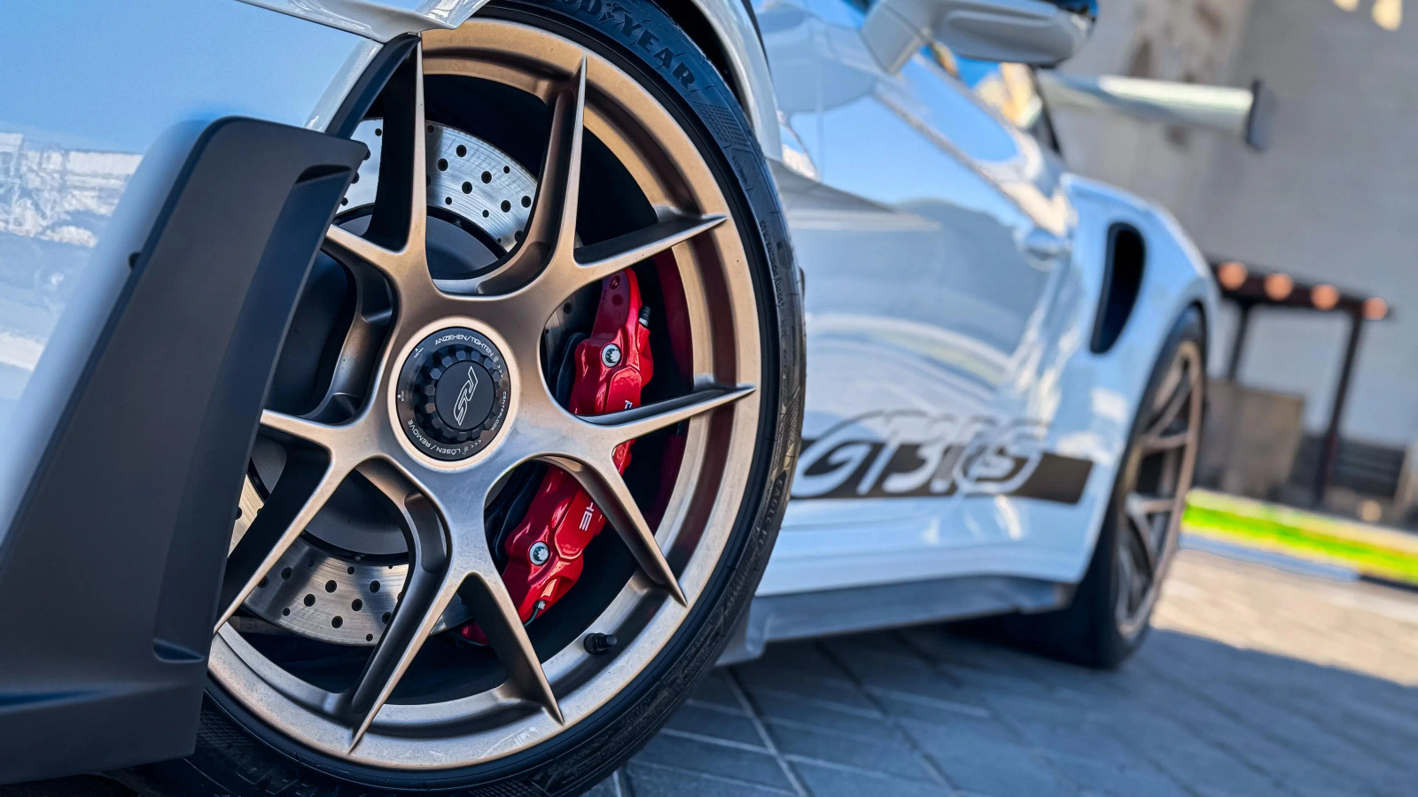 Porsche 911 GT3 RS front wheel, brake disc, red caliper and side body